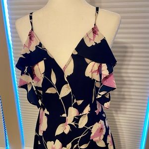 NWT Navy Blue Floral Romper - From Entro. Ruffle off the shoulder sleeve detail